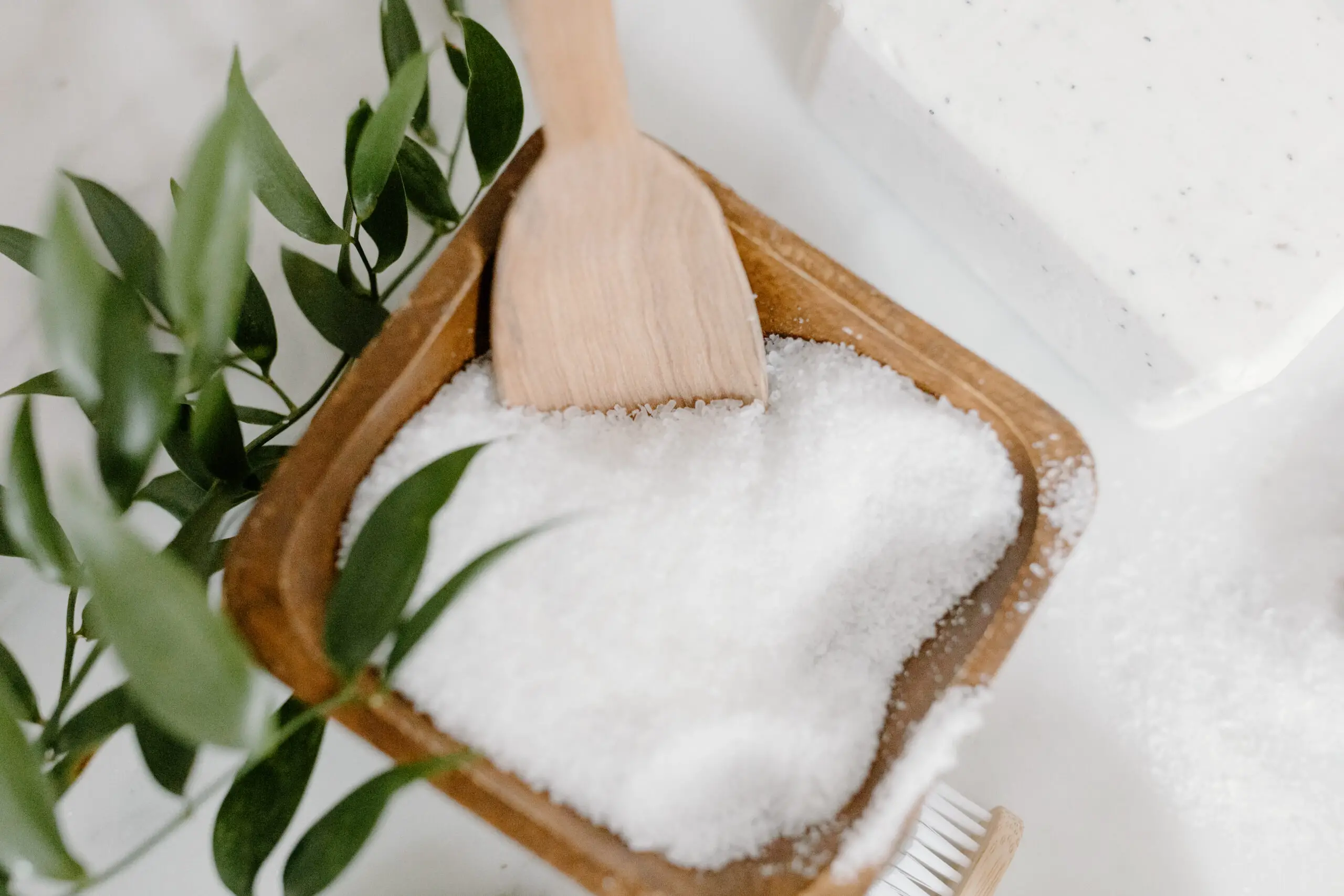 Salt on a wooden bowl to cleanse items